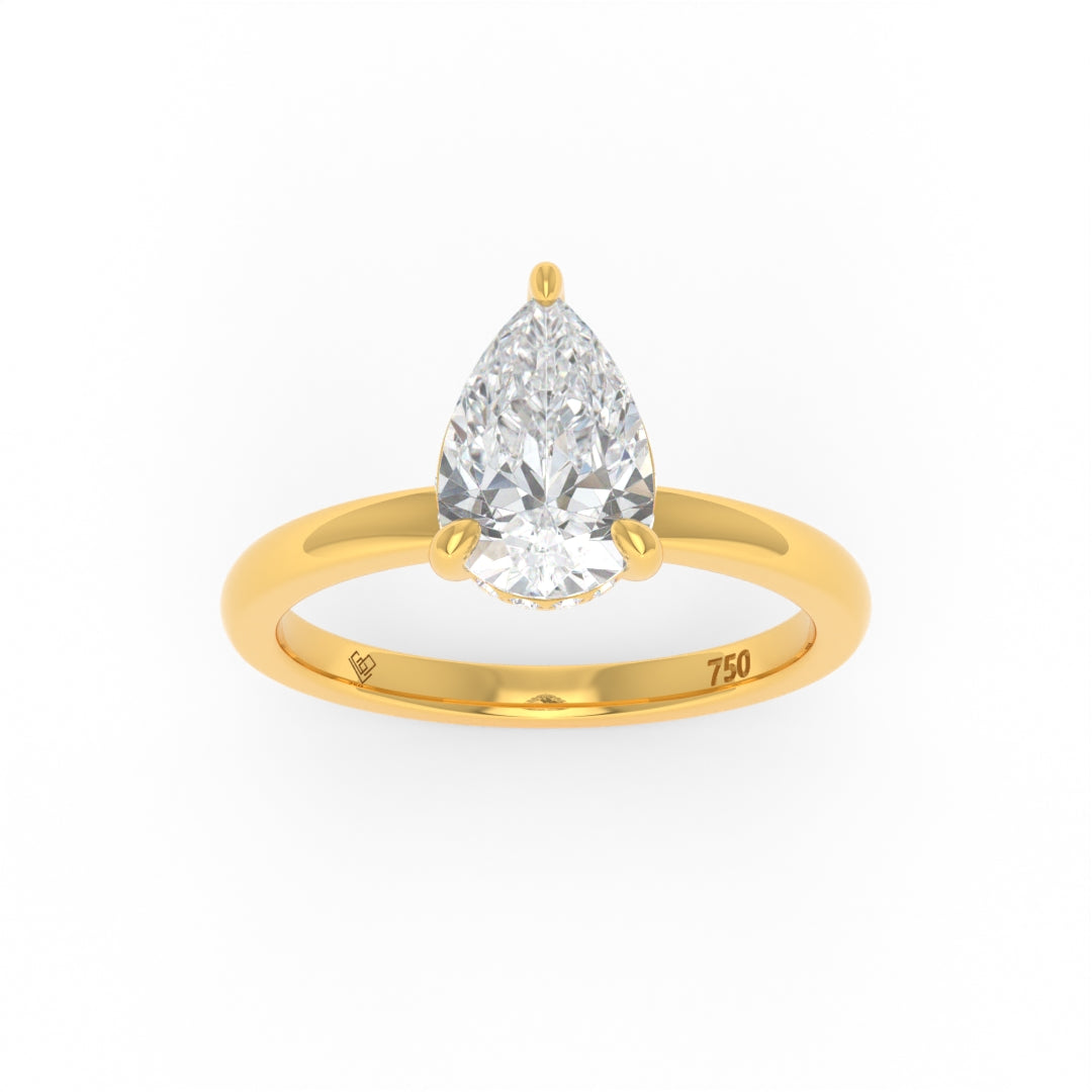 Léa Pear Cut Diamond engagement ring with hidden halo set in 18k gold