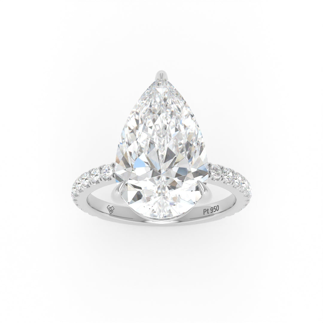 Abigail pear engagement ring with pear cut solitaire diamond and diamond band in platinum