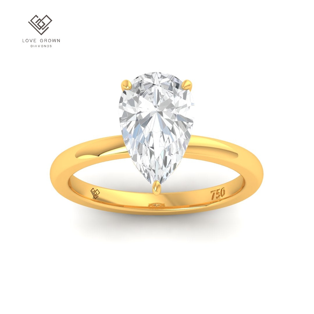 Léa Pear Cut Diamond With Hidden Halo Engagement Ring