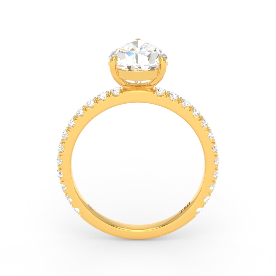 Abigail pear engagement ring with pear cut solitaire diamond and diamond band in gold setting