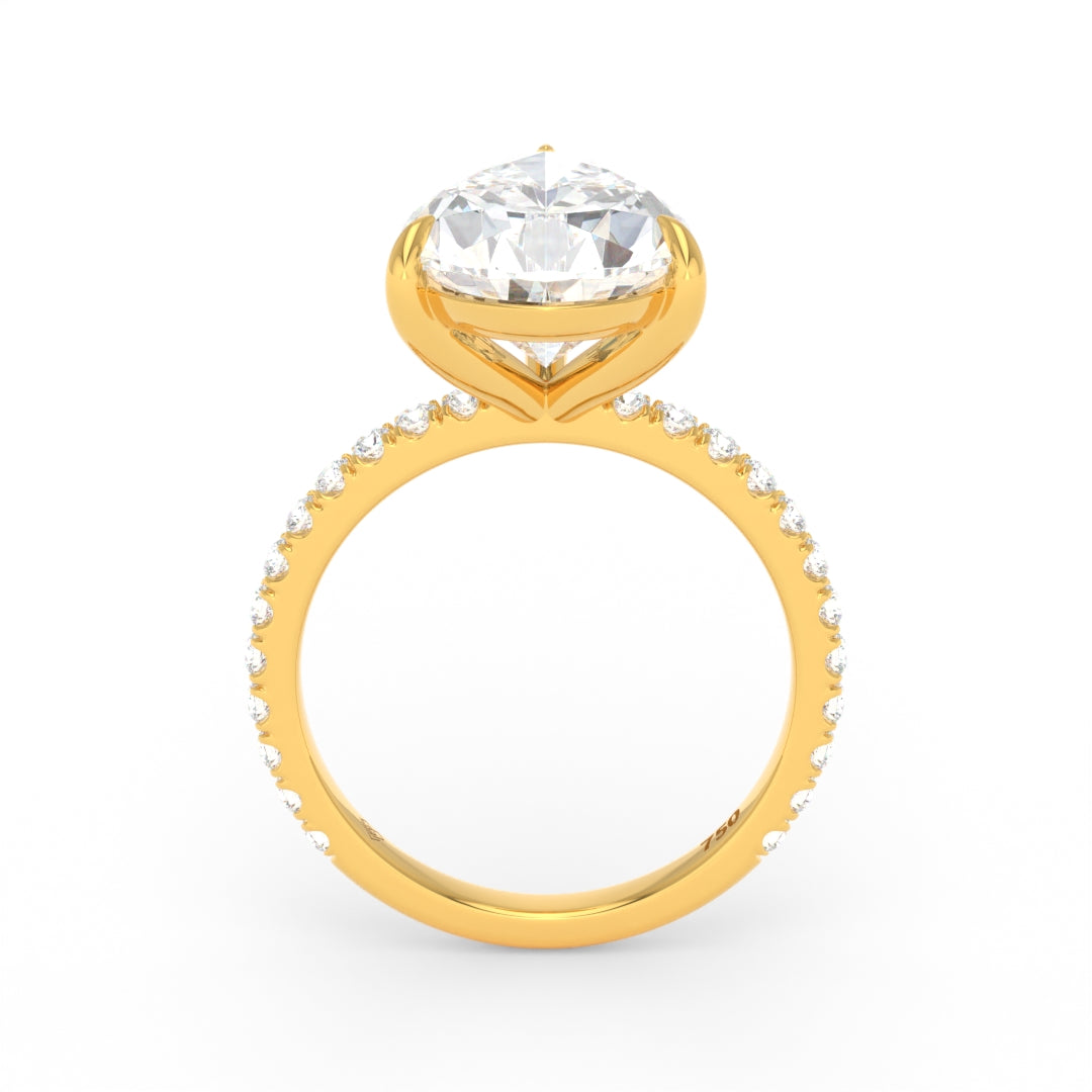 Abigail pear engagement ring with pear cut solitaire diamond and diamond band in gold setting
