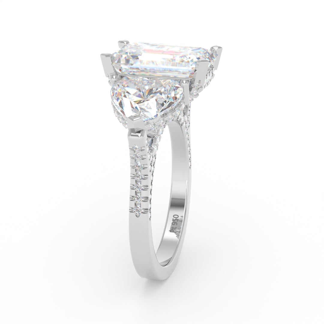 Victoria Emerald Cut Diamond Engagement Ring with Heart Cut Side Diamonds and 3D Diamond Band