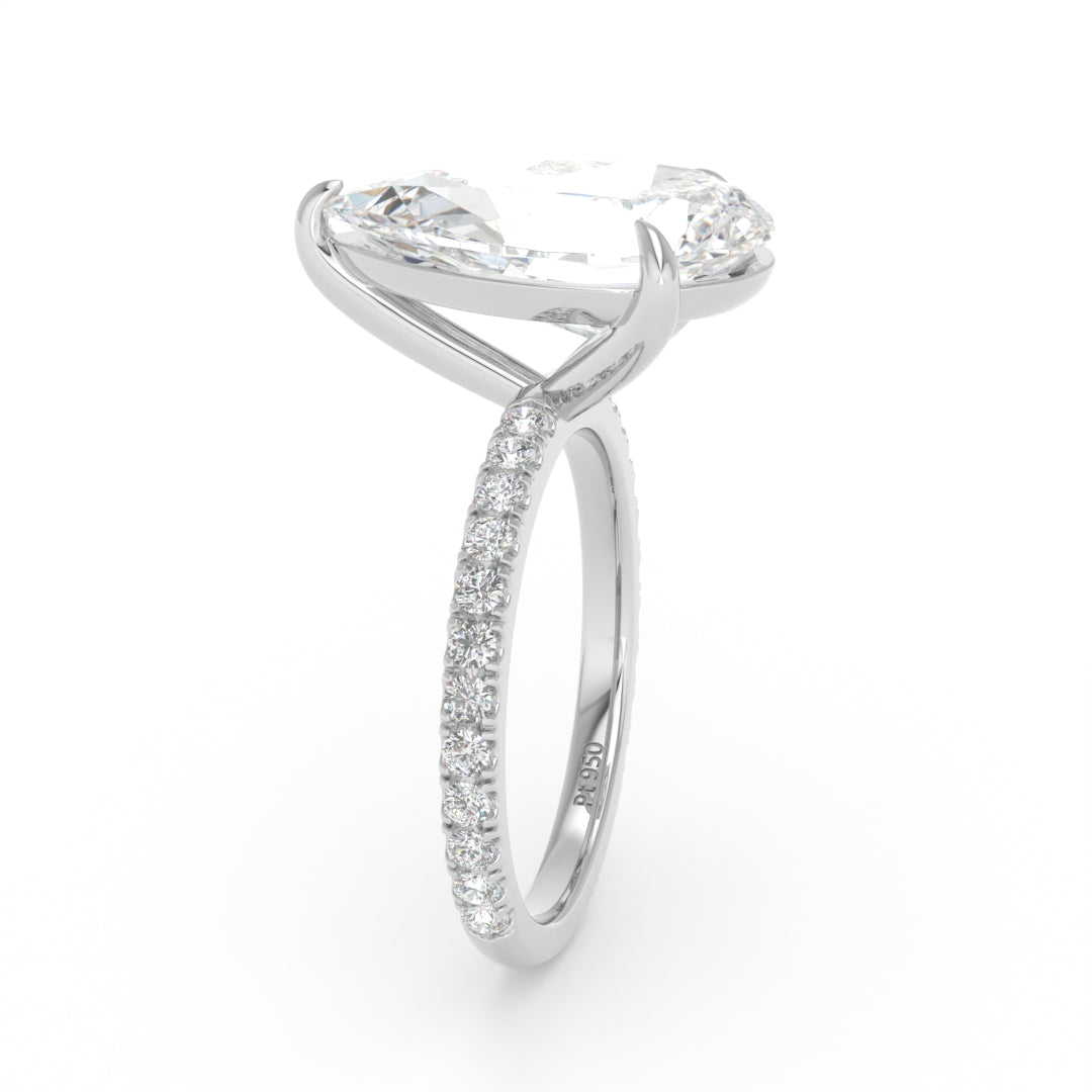 Abigail pear engagement ring with pear cut solitaire diamond and diamond band in platinum setting