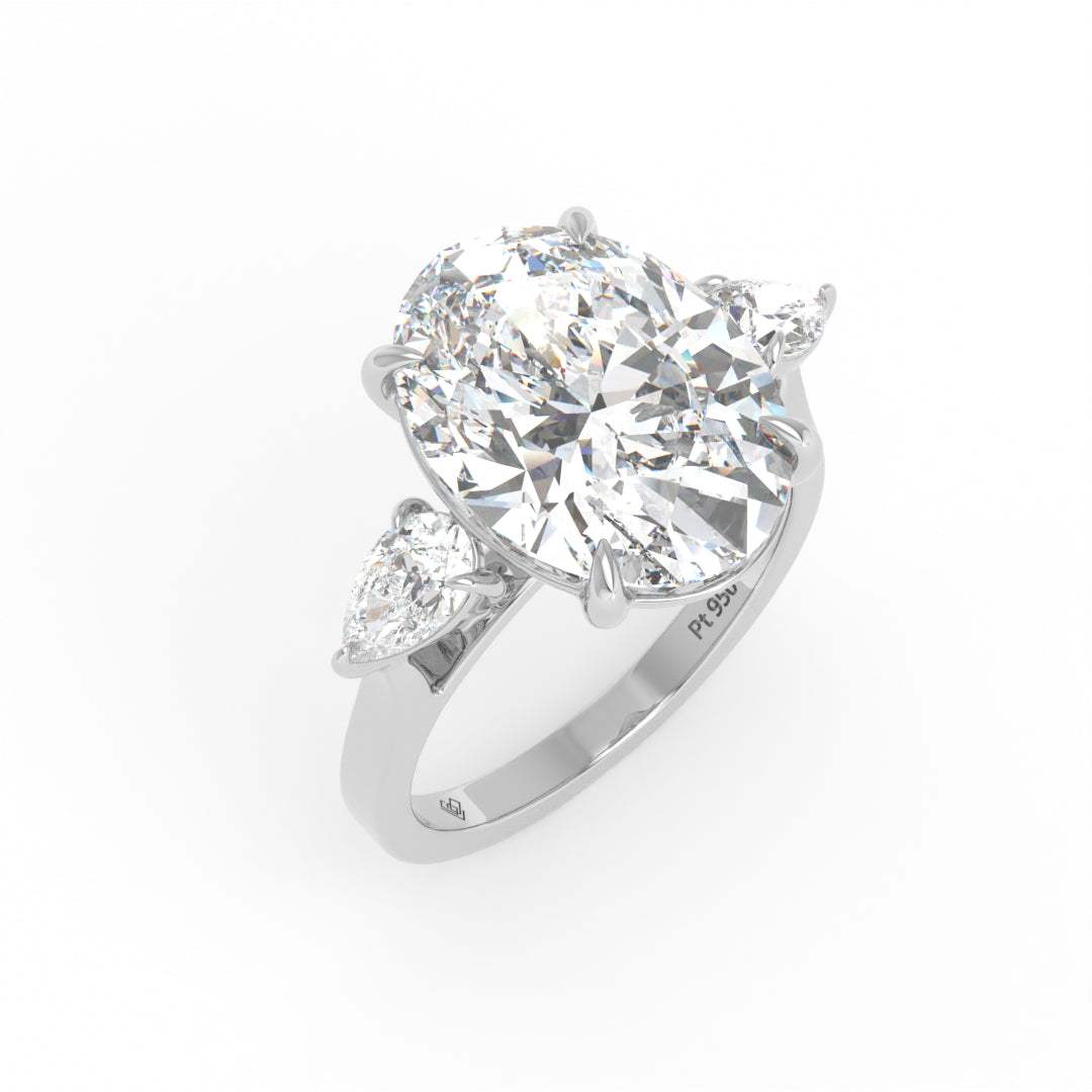 Sofia Oval Cut Diamond Engagement Ring With A Pear Cut Side Diamonds