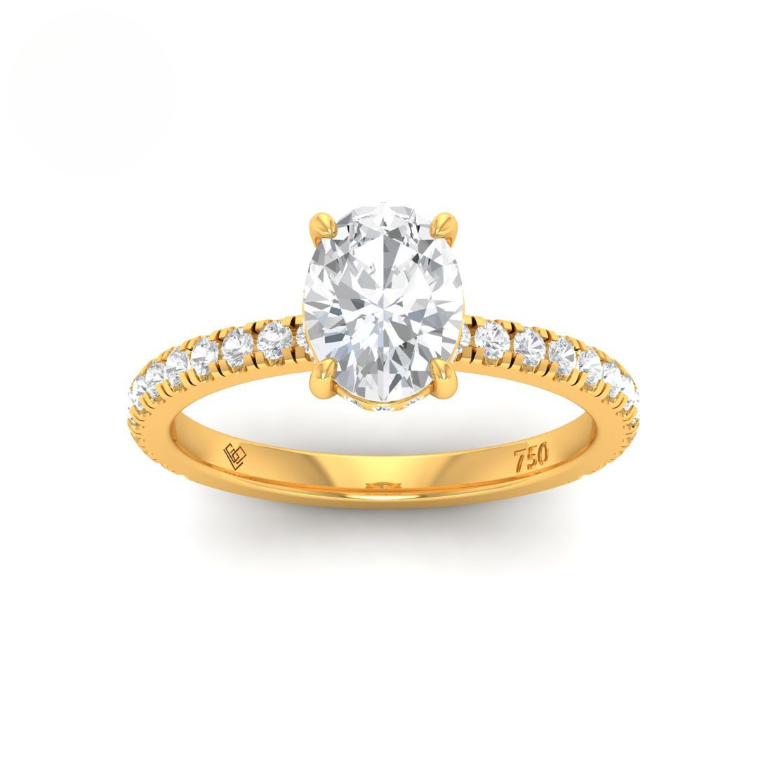 Chloé oval cut diamond engagement ring with hidden diamond halo and diamond band in 18k gold