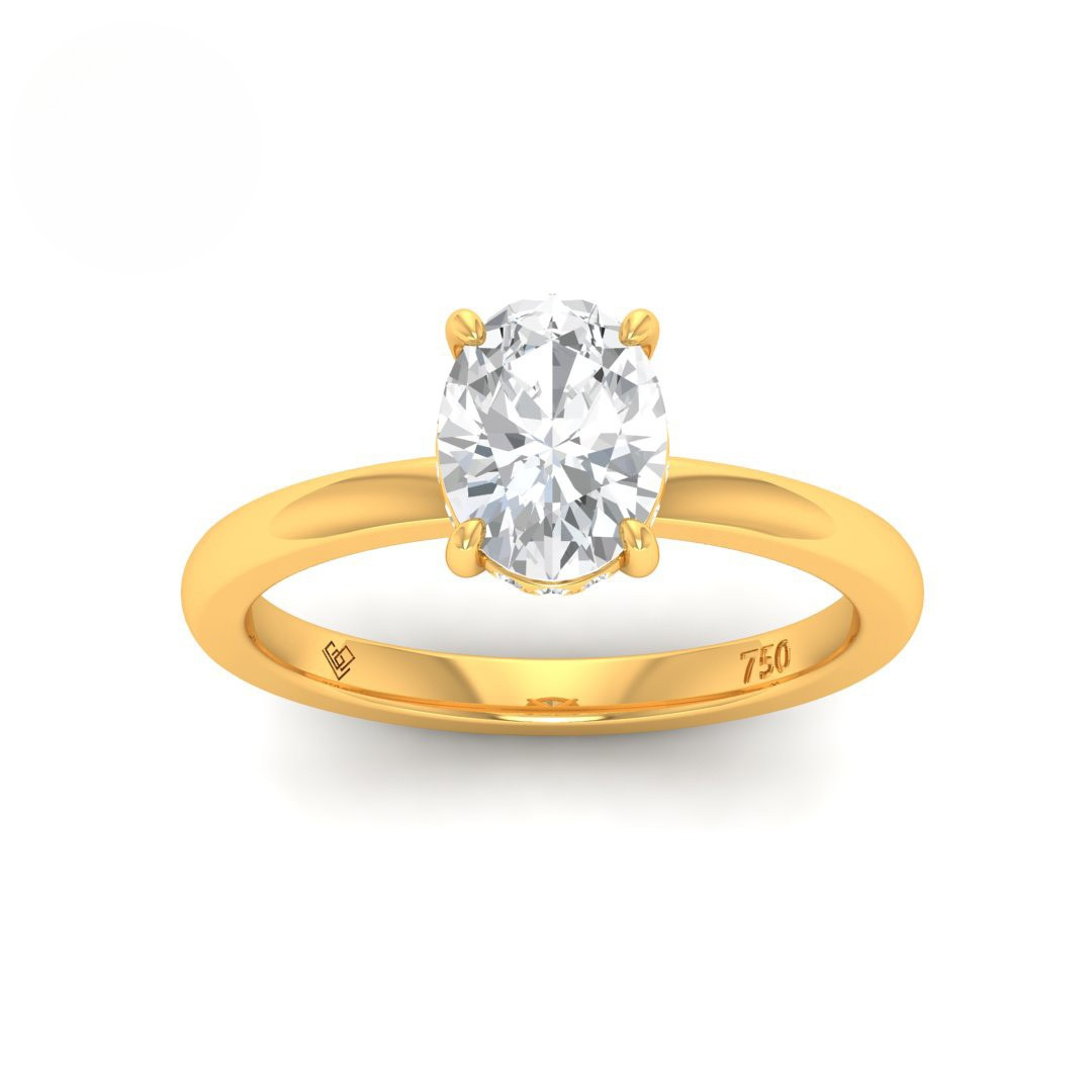 Léa oval cut diamond engagement ring with hidden halo in 18k gold setting