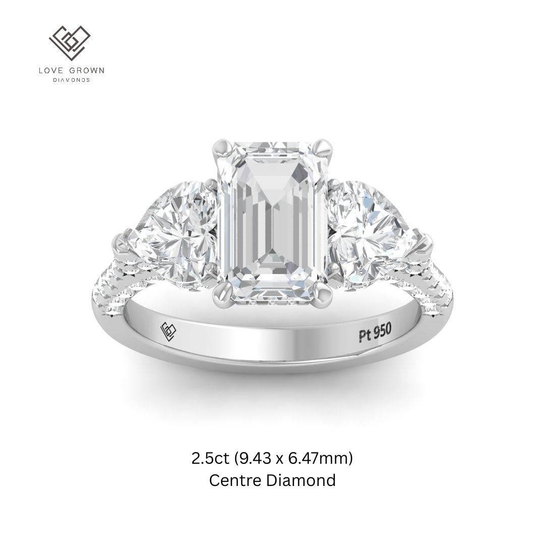 Victoria Emerald Cut Diamond Engagement Ring with Heart Cut Side Diamonds and 3D Diamond Band