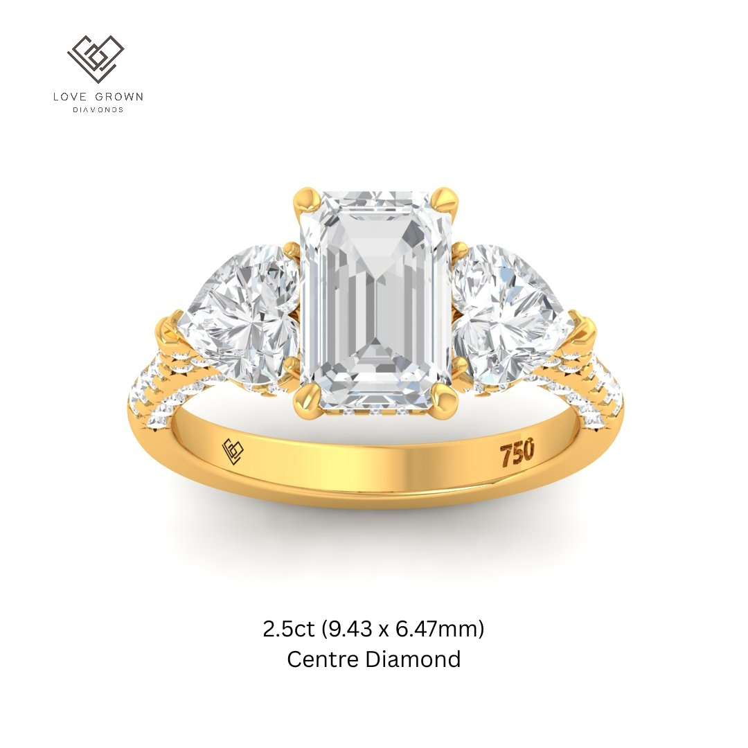 Victoria Emerald Cut Diamond Engagement Ring with Heart Cut Side Diamonds and 3D Diamond Band