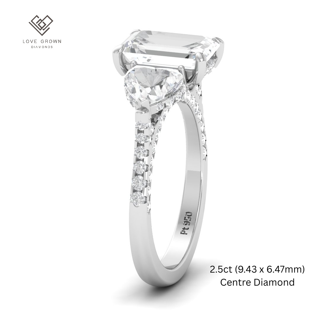 Victoria Emerald Cut Diamond Engagement Ring with Heart Cut Side Diamonds and 3D Diamond Band