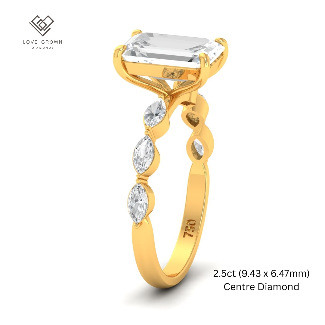 Kasandra Emerald Cut Diamond Engagement RIng With A Marquise Cut Diamonds Band