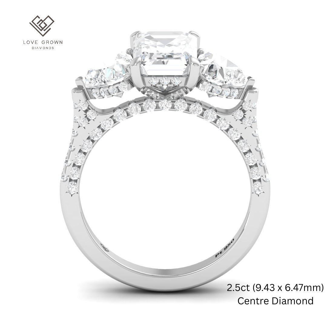 Victoria Emerald Cut Diamond Engagement Ring with Heart Cut Side Diamonds and 3D Diamond Band