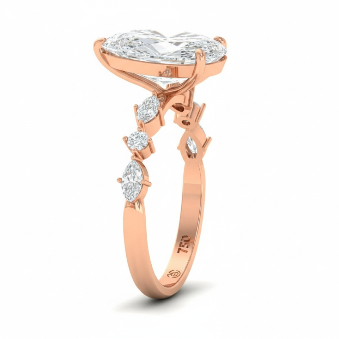 Elizabeth Pear Cut Diamond Engagement Ring With A Marquise And Round Cut Diamond Band