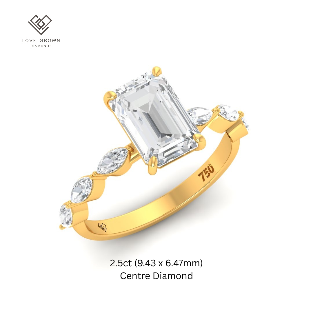 Kasandra Emerald Cut Diamond Engagement RIng With A Marquise Cut Diamonds Band