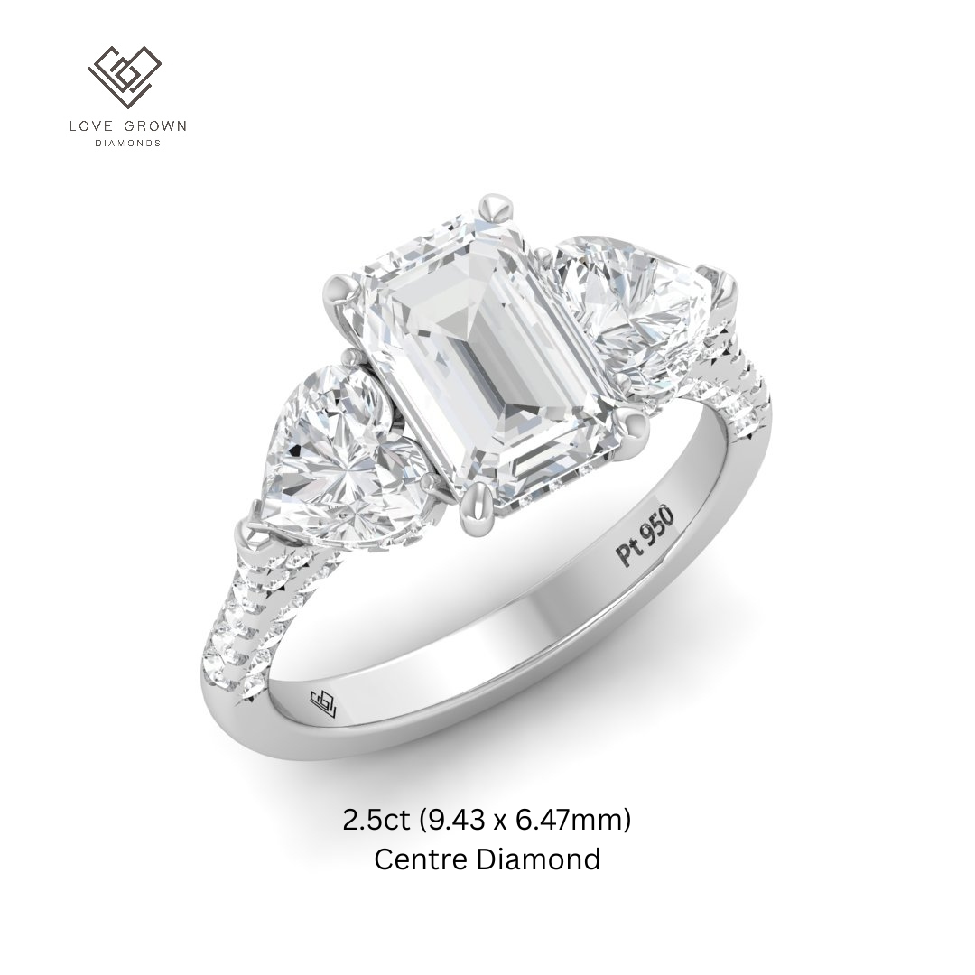 Victoria Emerald Cut Diamond Engagement Ring with Heart Cut Side Diamonds and 3D Diamond Band