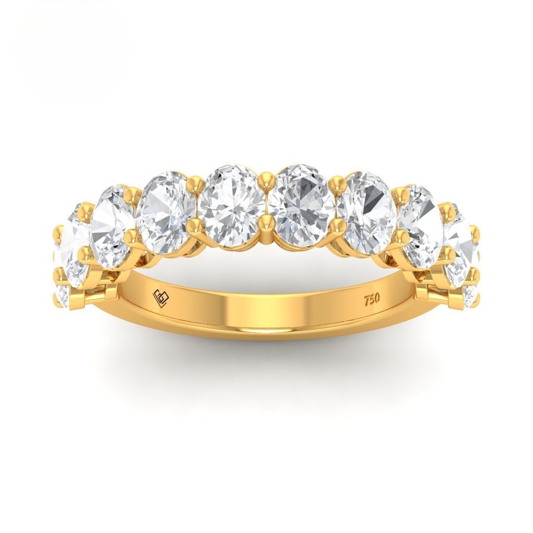 Edith Oval cut wedding band with 2.50ct oval diamonds set in yellow gold prong setting