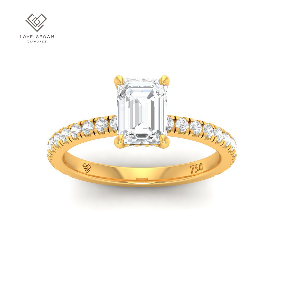 Chloé emerald cut diamond engagement ring with hidden halo and diamond band.
