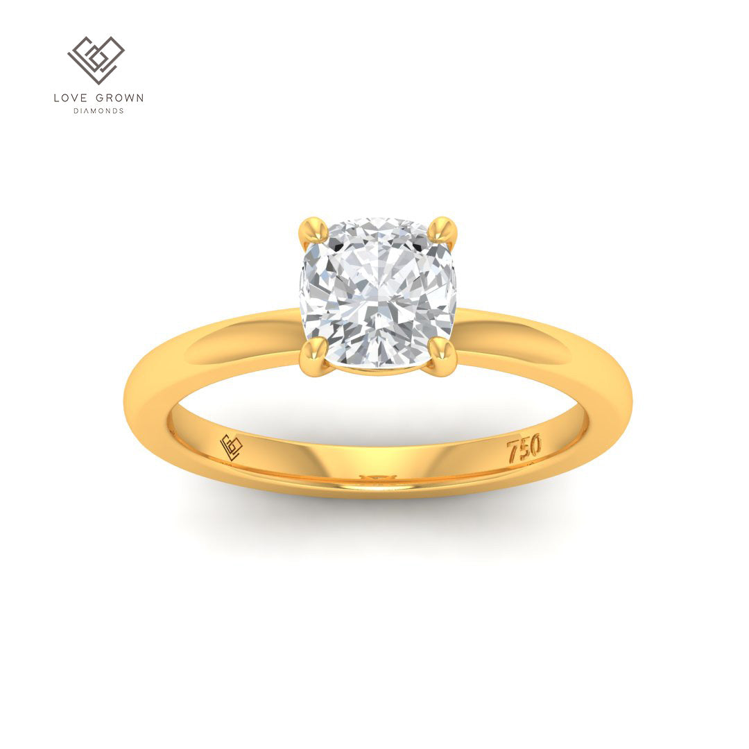 Noémie Solitaire Cushion Cut Diamond Engagement Ring in 18k Gold Band.