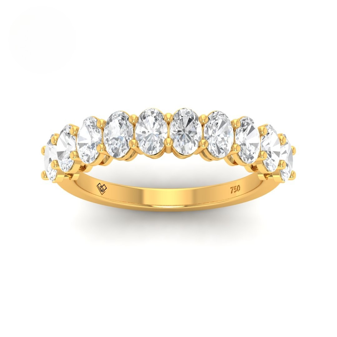 Estelle Oval cut wedding band with 1.50ct oval diamonds set in yellow gold prong setting.