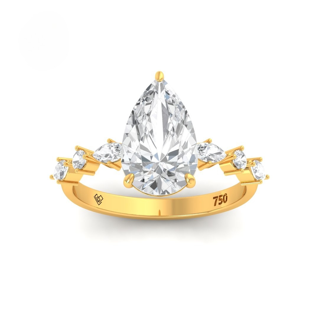 Elizabeth Pear Cut Diamond Engagement Ring With A Marquise And Round Cut Diamond Band
