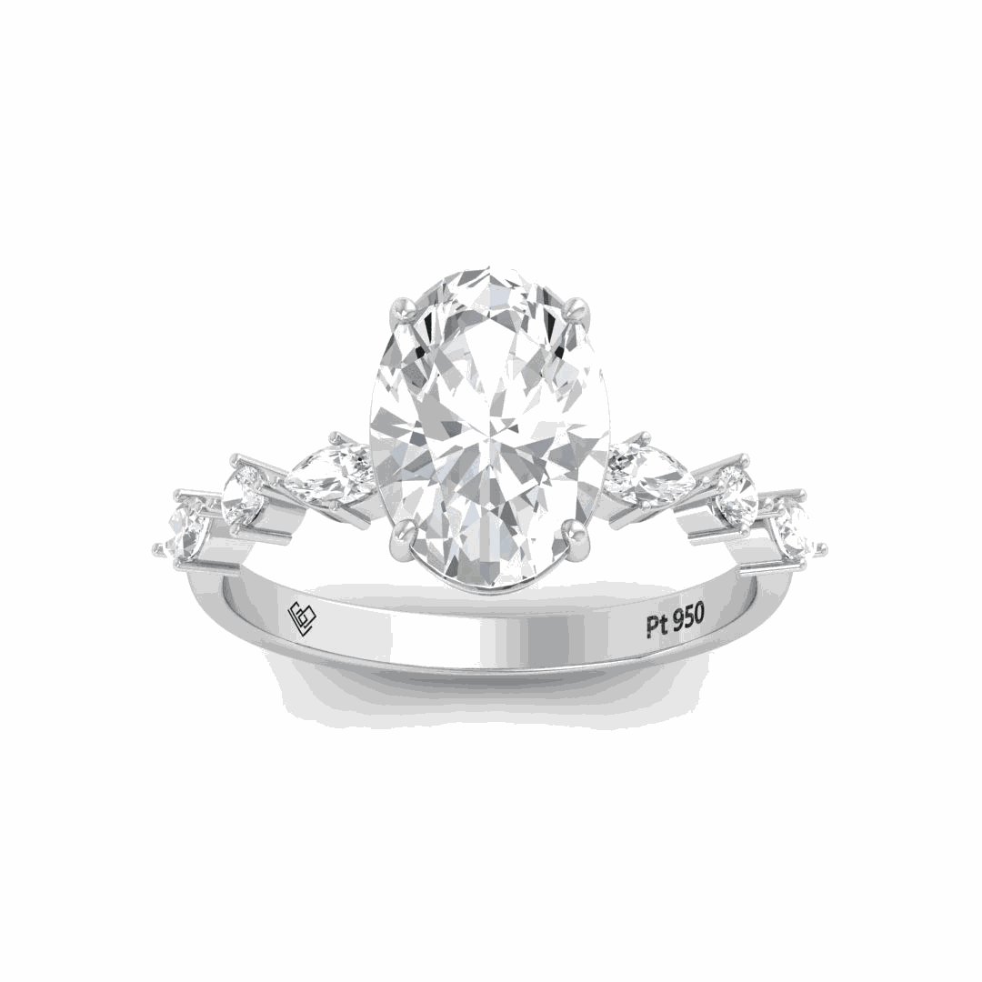 Elizabeth Oval Cut Diamond Engagement Ring With A Marquise And Round Cut Diamond Band.