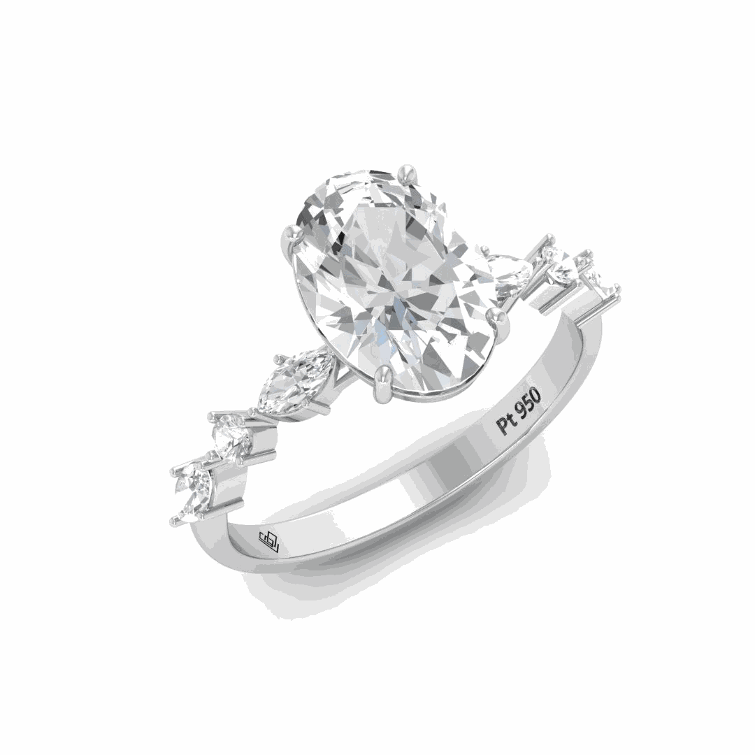 Elizabeth Oval Cut Diamond Engagement Ring With A Marquise And Round Cut Diamond Band.