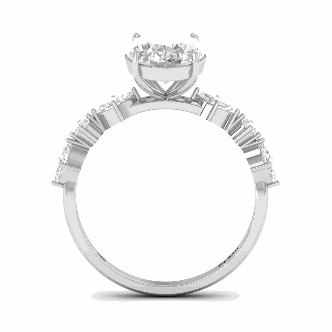 Elizabeth Oval Cut Diamond Engagement Ring With A Marquise And Round Cut Diamond Band.