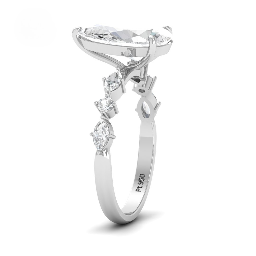 Elizabeth Pear Cut Diamond Engagement Ring With A Marquise And Round Cut Diamond Band