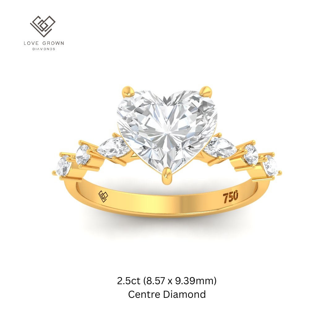 Elizabeth Heart Cut Diamond Engagement Ring With A Marquise and Round Cut Diamond Band
