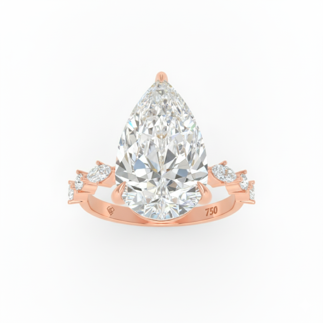 Elizabeth Pear Cut Diamond Engagement Ring With A Marquise And Round Cut Diamond Band