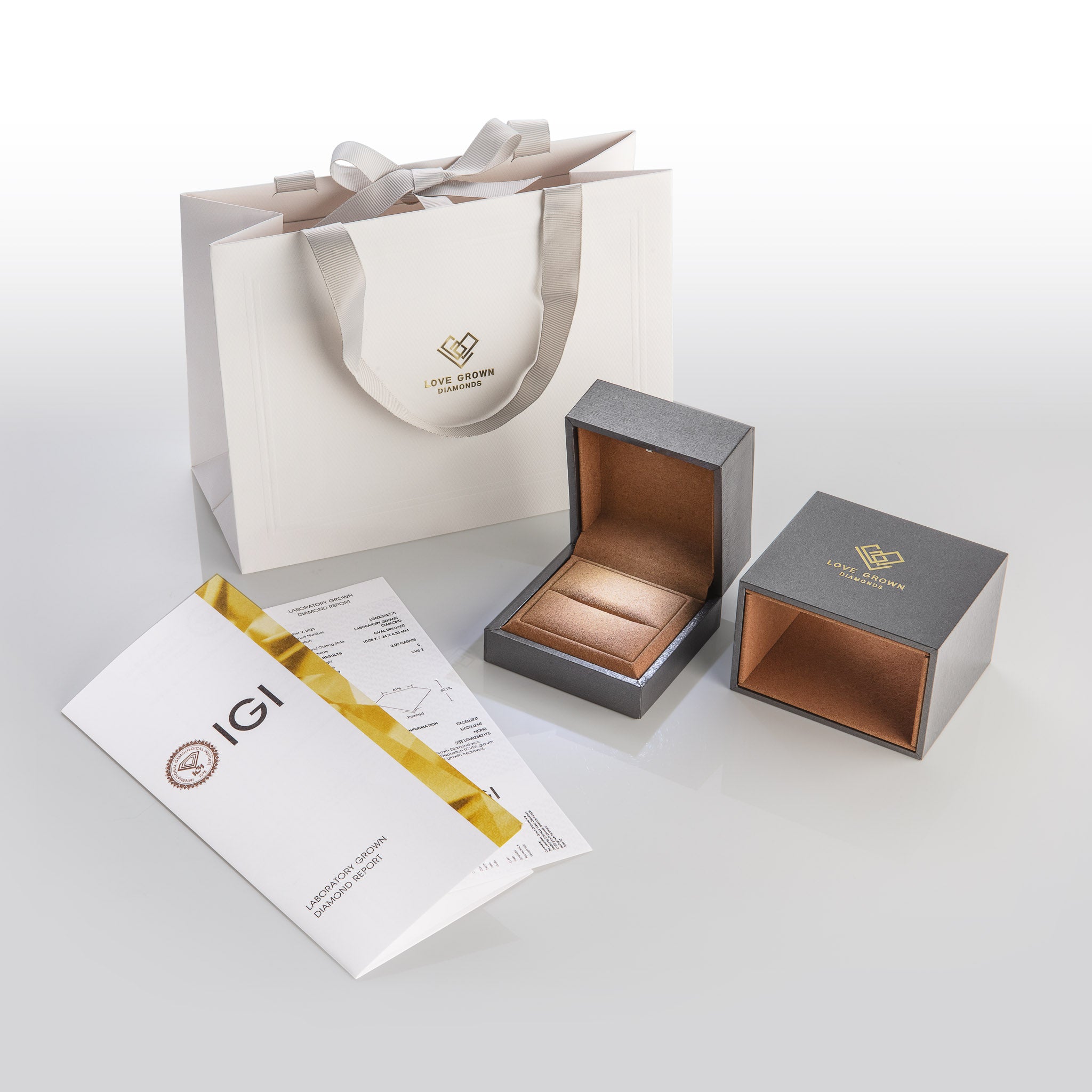 Victoria Radiant Cut Diamond Engagement Ring with Heart Cut Side Diamonds and 3D Diamond Band