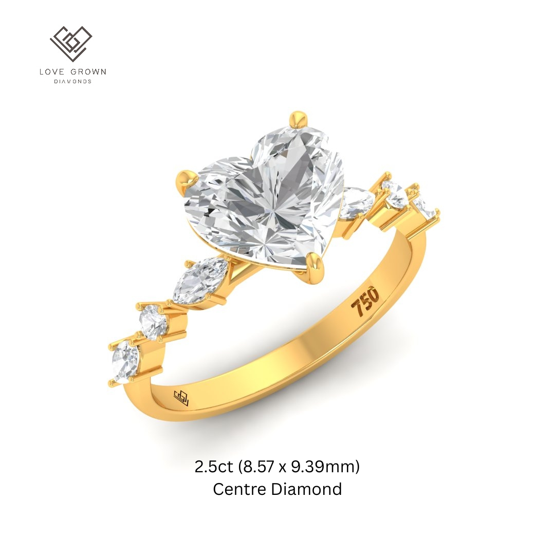 Elizabeth Heart Cut Diamond Engagement Ring With A Marquise and Round Cut Diamond Band
