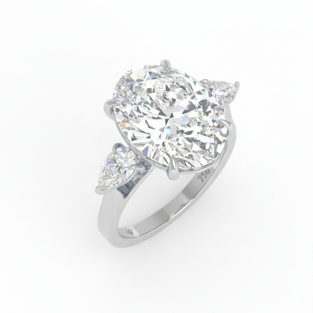 Sofia Oval Cut Diamond Engagement Ring With A Pear Cut Side Diamonds