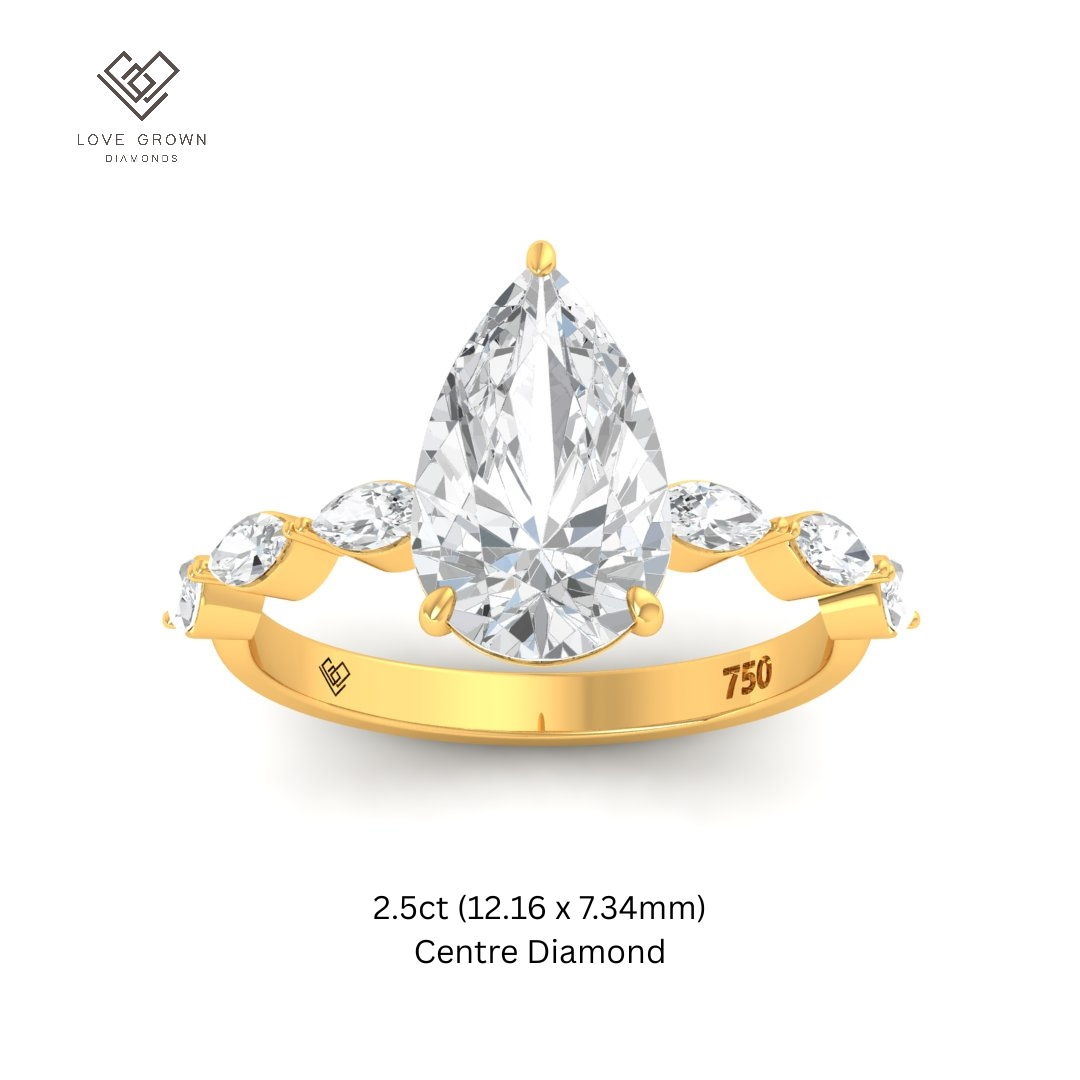 Kasandra Pear Cut Diamond Engagement Ring With A Marquise Cut Diamond Band