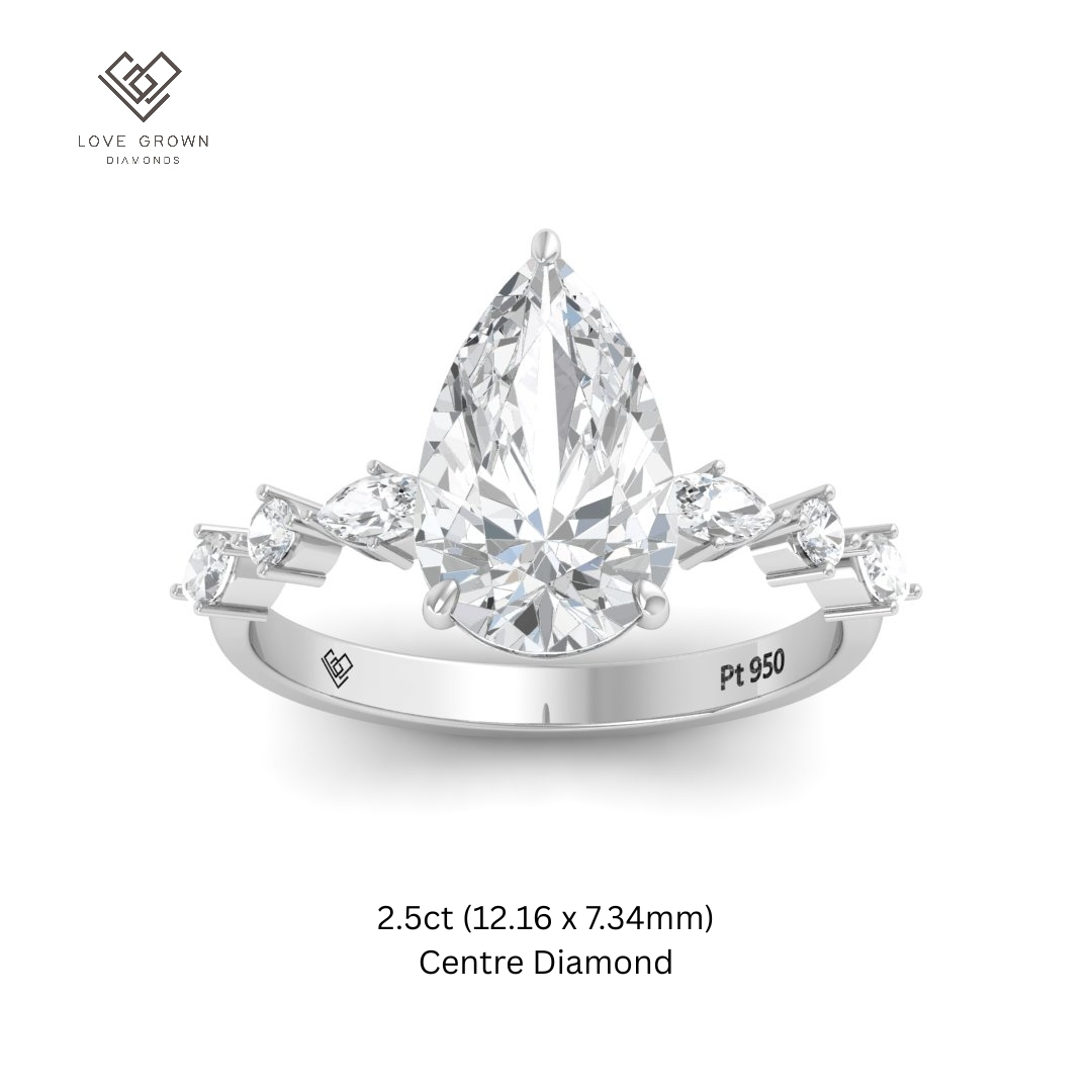 Elizabeth Pear Cut Diamond Engagement Ring With A Marquise And Round Cut Diamond Band