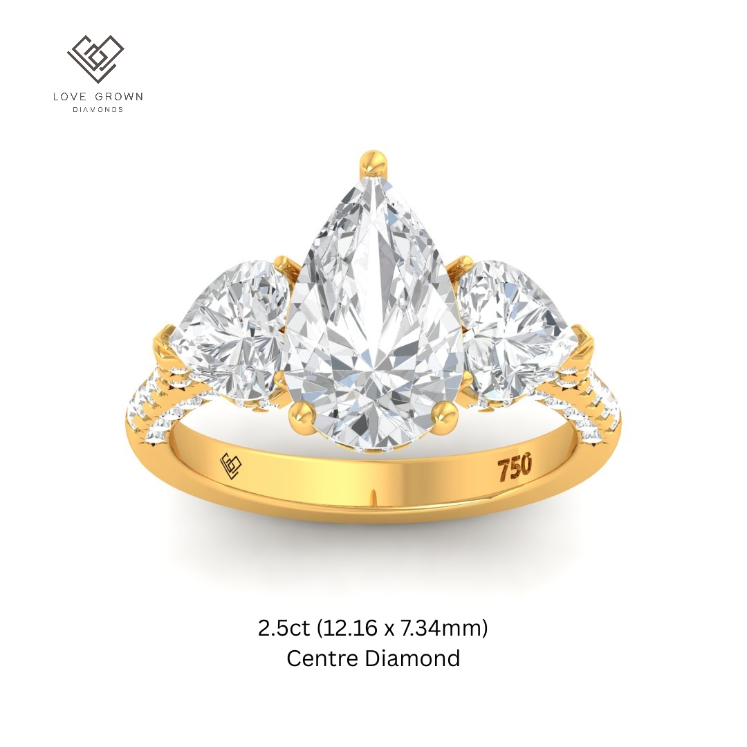 Victoria Pear Cut Diamond Engagement Ring with Heart Cut Side Diamonds and 3D Diamond Band