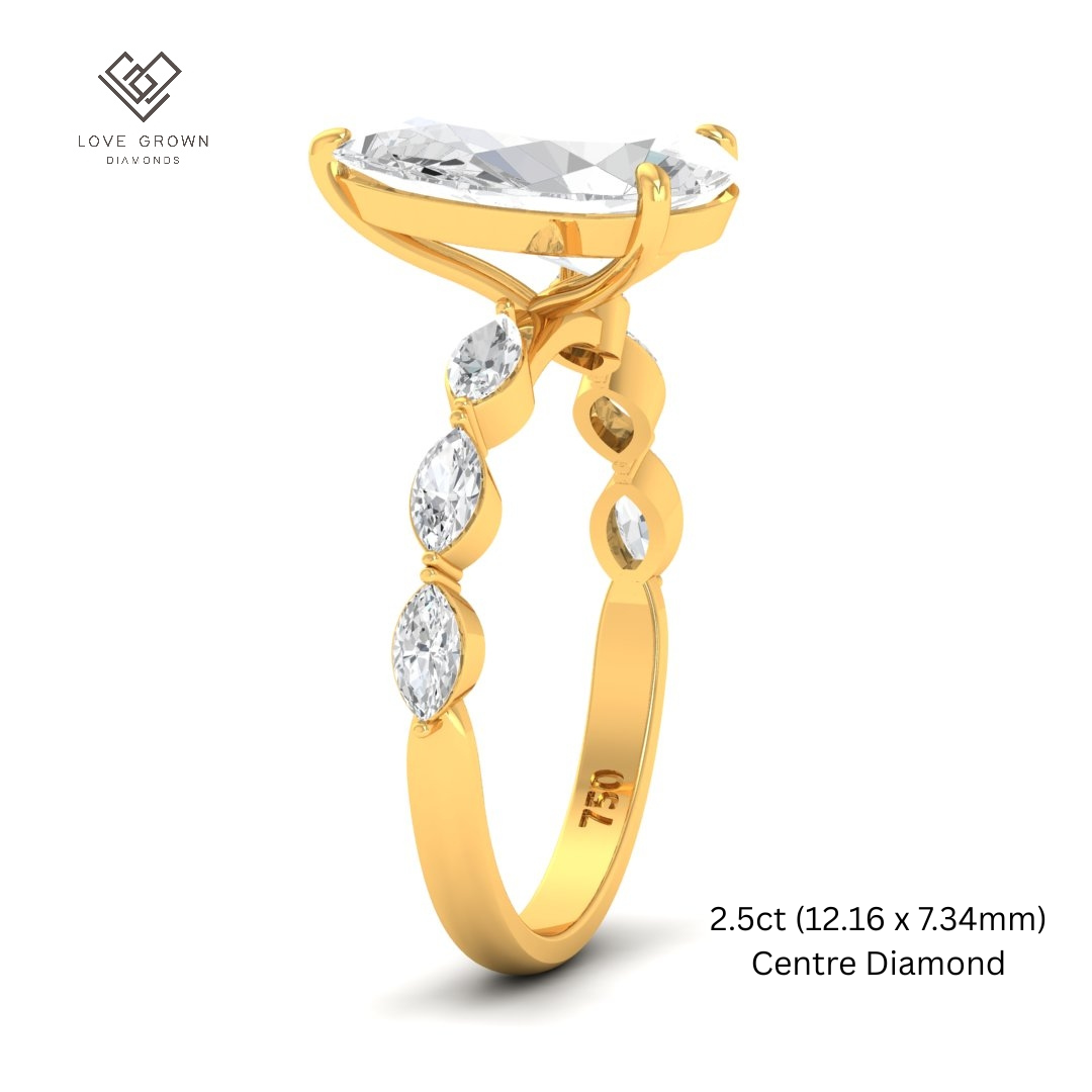 Kasandra Pear Cut Diamond Engagement Ring With A Marquise Cut Diamond Band