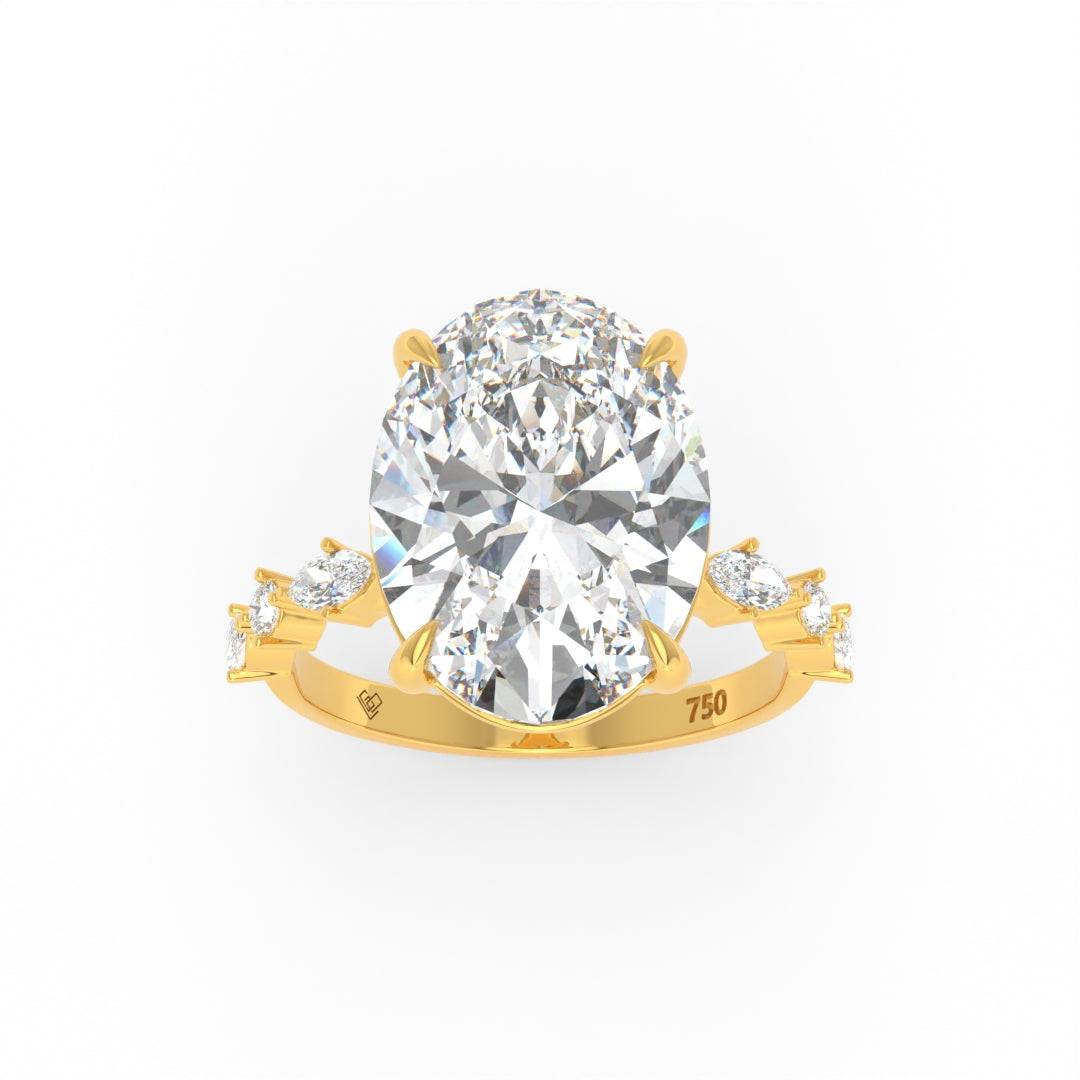Elizabeth Oval Cut Diamond Engagement Ring With A Marquise And Round Cut Diamond Band.