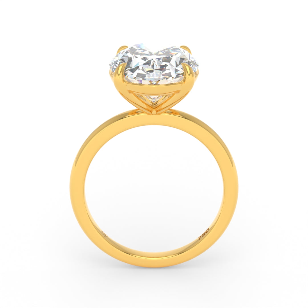 Solitaire Oval cut diamond engagement ring with 18k yellow gold band and four-claw setting