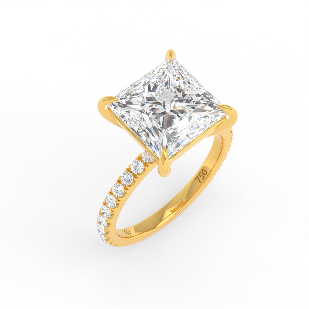 Princess cut lab-grown diamond engagement ring with gold band and side diamonds by Love Grown Diamonds