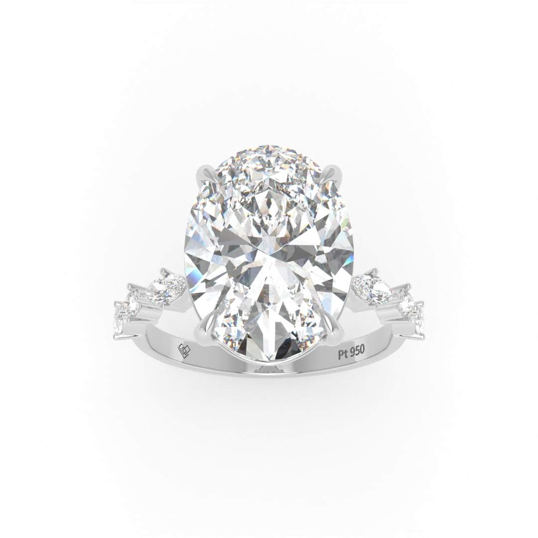 Elizabeth Oval Cut Diamond Engagement Ring With A Marquise And Round Cut Diamond Band.