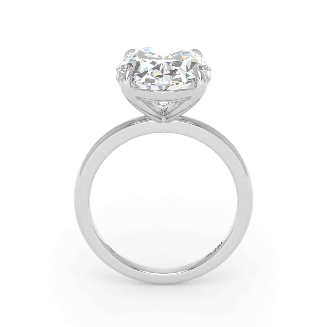 Solitaire Oval cut diamond engagement ring with platinum band and four-claw setting