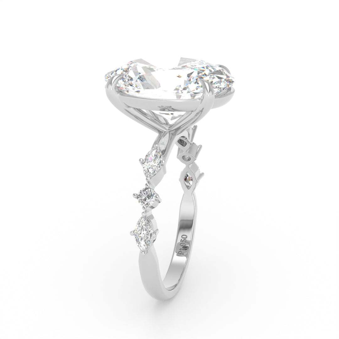 Elizabeth Oval Cut Diamond Engagement Ring With A Marquise And Round Cut Diamond Band.