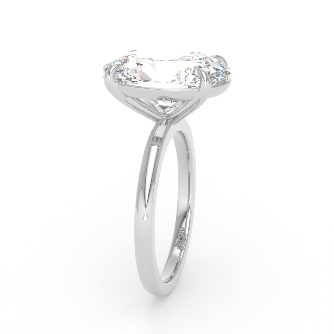 Solitaire Oval cut diamond engagement ring with platinum band and four-claw setting