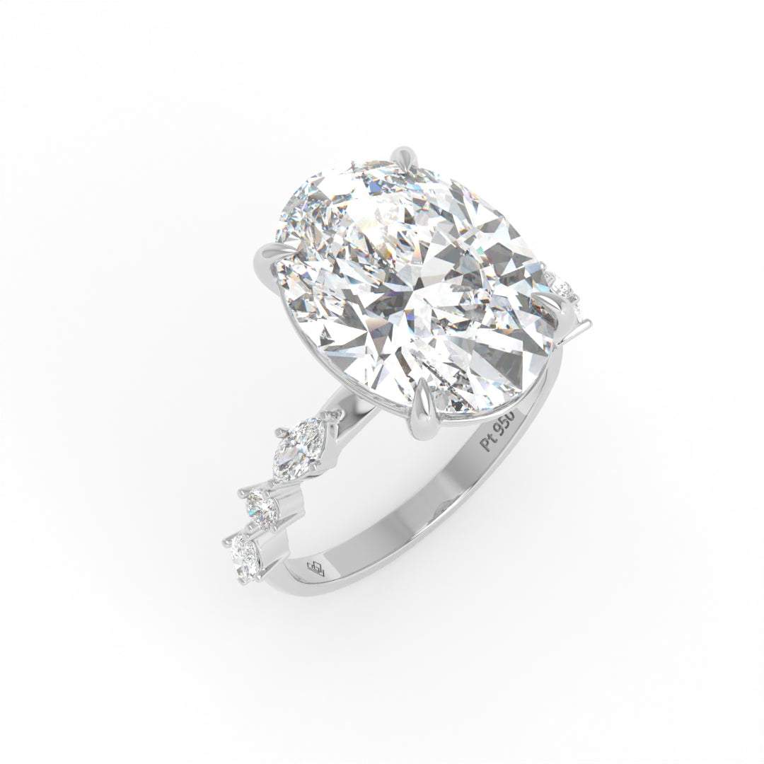 Elizabeth Oval Cut Diamond Engagement Ring With A Marquise And Round Cut Diamond Band.
