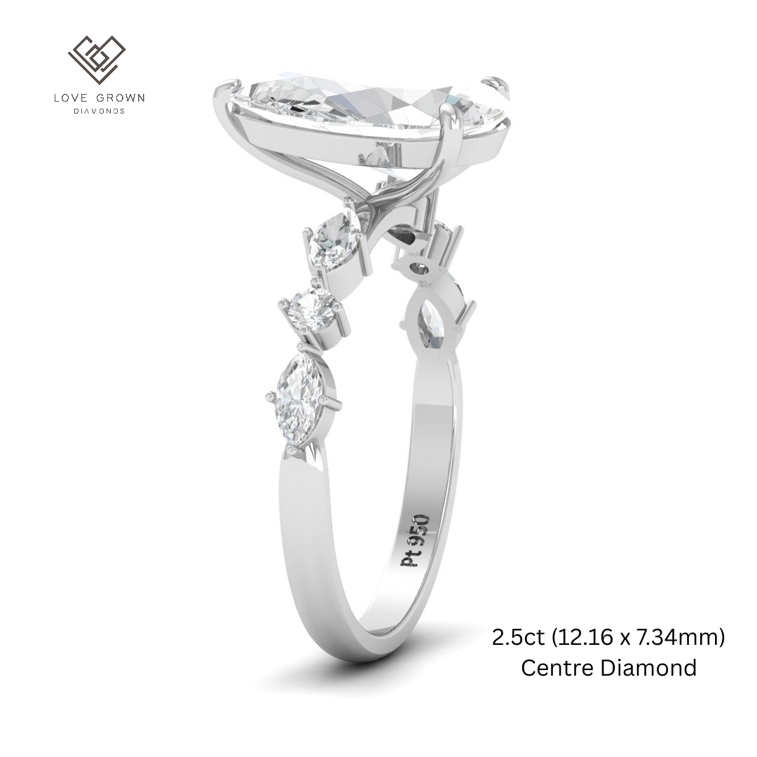 Elizabeth Pear Cut Diamond Engagement Ring With A Marquise And Round Cut Diamond Band