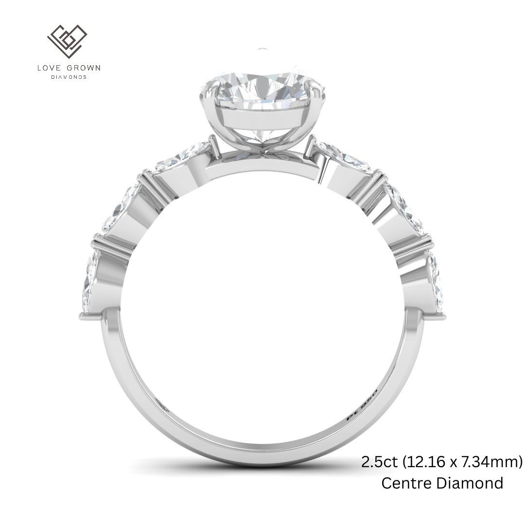 Kasandra Pear Cut Diamond Engagement Ring With A Marquise Cut Diamond Band