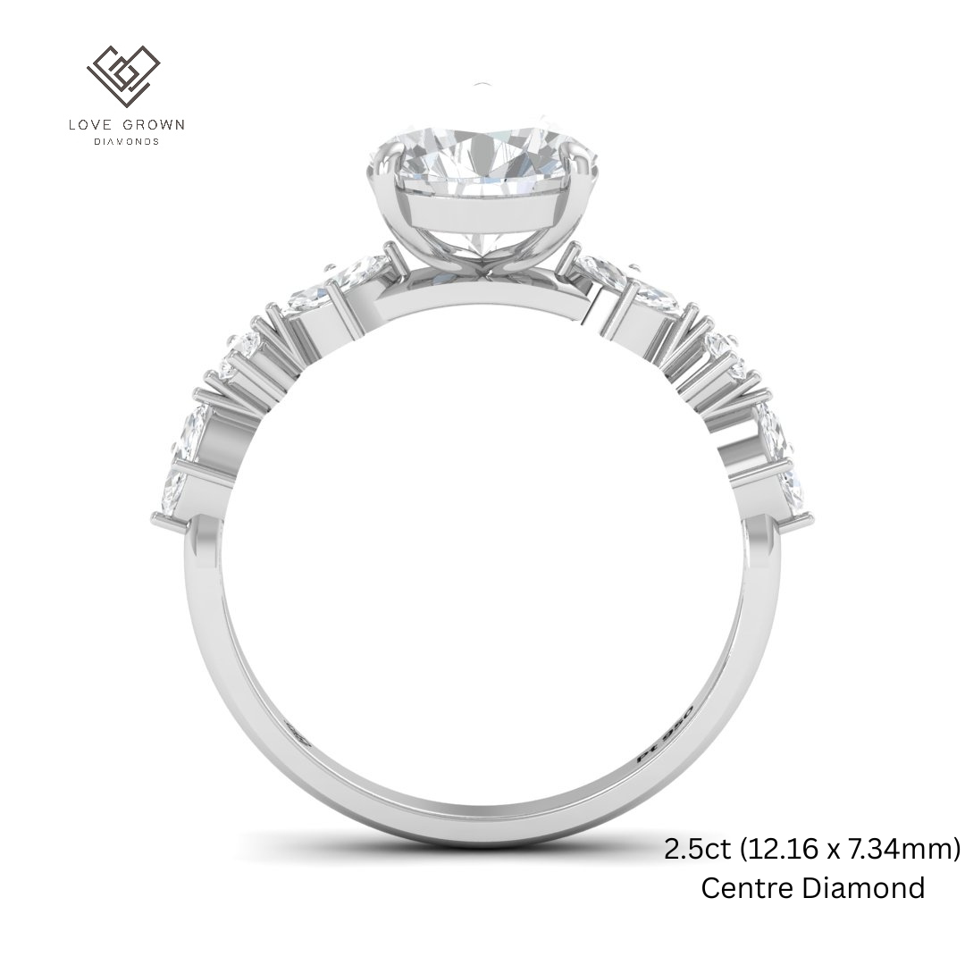 Elizabeth Pear Cut Diamond Engagement Ring With A Marquise And Round Cut Diamond Band