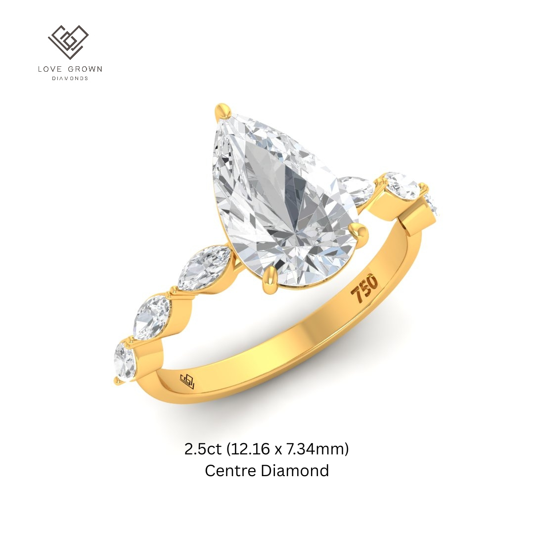 Kasandra Pear Cut Diamond Engagement Ring With A Marquise Cut Diamond Band