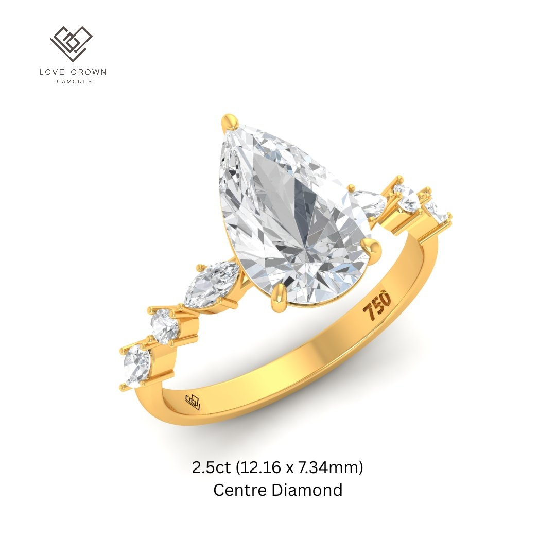 Elizabeth Pear Cut Diamond Engagement Ring With A Marquise And Round Cut Diamond Band