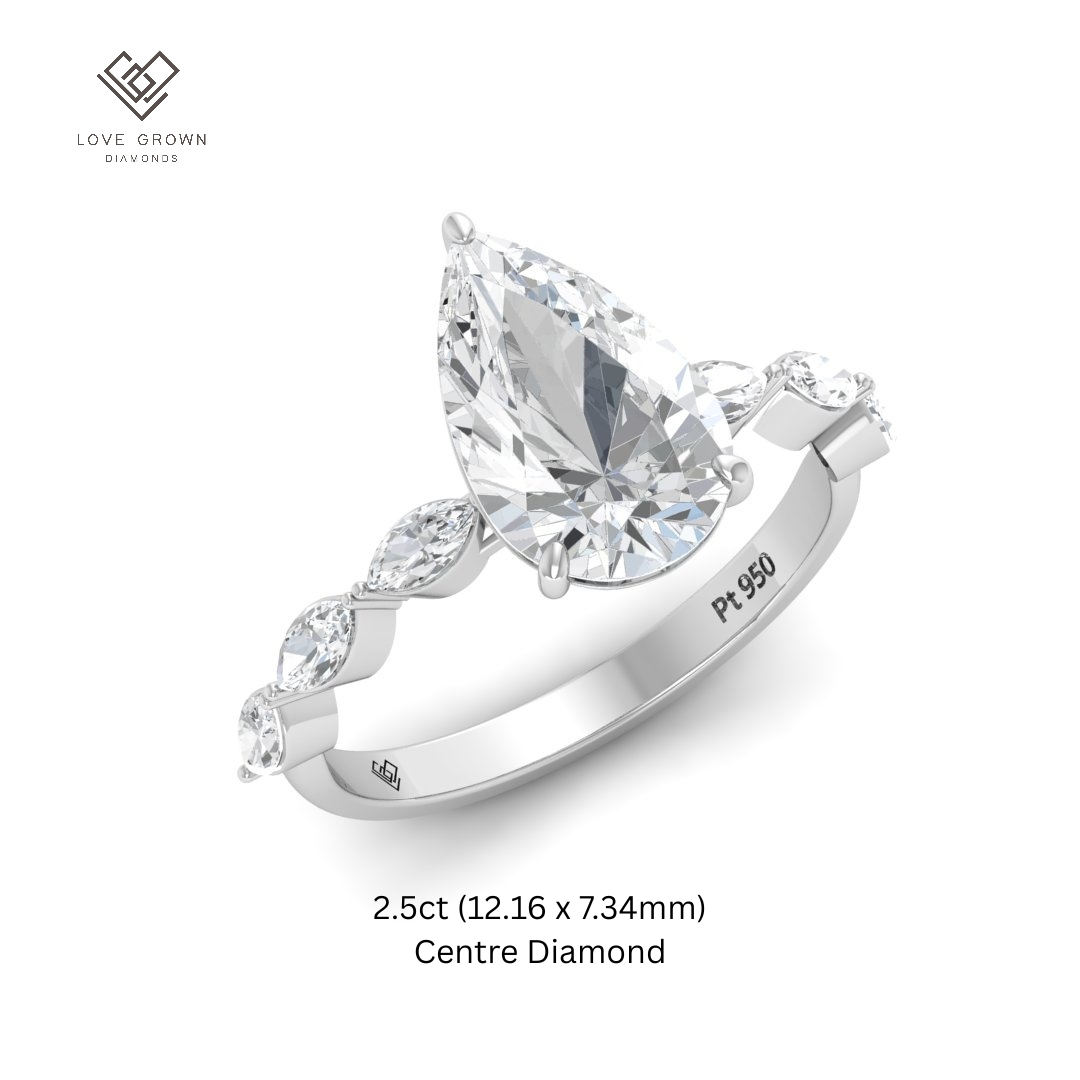 Kasandra Pear Cut Diamond Engagement Ring With A Marquise Cut Diamond Band